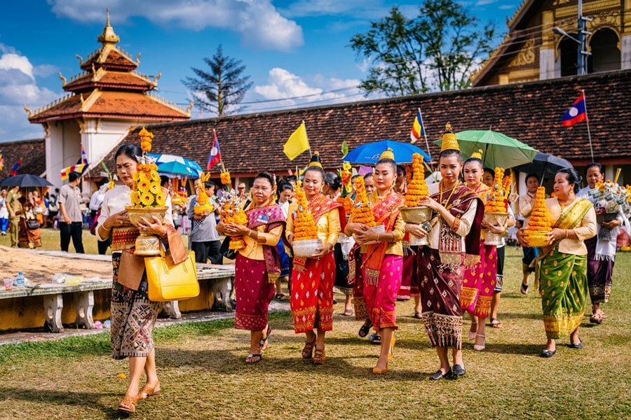 Admiring the unique beauty of the traditional costumes of Laos